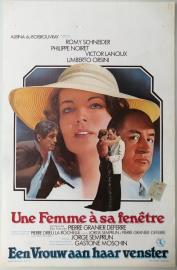 UNE FEMME A SA FENETRE